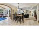 Open floor plan highlighting the kitchen and living room areas with neutral tones and archway detailing at 3456 Drayton Ne Dr, Roswell, GA 30075