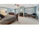 Spacious main bedroom featuring a fireplace, sitting area, and ensuite bathroom entrance at 3456 Drayton Ne Dr, Roswell, GA 30075
