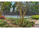 Well-maintained community tennis court surrounded by greenery and a secure fence at 3456 Drayton Ne Dr, Roswell, GA 30075