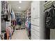 Spacious walk-in closet with custom shelving and ample storage for clothes and accessories at 3456 Drayton Ne Dr, Roswell, GA 30075