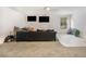 Spacious basement area with carpet and concrete floors perfect for setting up a recreational area with a couch at 1023 Bentley Estates Dr, Dacula, GA 30019