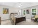 Bedroom features ceiling fan and natural light at 4027 Mount Vernon Dr, Woodstock, GA 30189