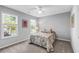 Cozy bedroom with two bright windows and neutral carpet at 4027 Mount Vernon Dr, Woodstock, GA 30189