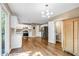 Bright kitchen featuring white cabinets, modern appliances, and hardwood floors at 4027 Mount Vernon Dr, Woodstock, GA 30189