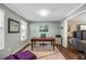 Bright office featuring hardwood floors, soothing wall color, and a large desk at 4027 Mount Vernon Dr, Woodstock, GA 30189