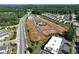 Expansive aerial view of the community showcasing its layout, amenities, and green surroundings at 4541 Moray Dr, Mableton, GA 30126