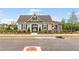 Charming clubhouse featuring neutral siding, black shutters, and professional landscaping at 4541 Moray Dr, Mableton, GA 30126