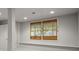 Finished basement featuring modern grey walls, recessed lighting, and a window with natural blinds at 635 Stone Harbor Sw Pkwy, Marietta, GA 30060