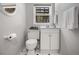 Cozy bathroom with neutral paint and a decorative mirror at 635 Stone Harbor Sw Pkwy, Marietta, GA 30060