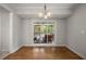 Elegant dining area with hardwood floors and sliding glass doors to the screened porch at 635 Stone Harbor Sw Pkwy, Marietta, GA 30060