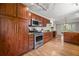 Open kitchen with stainless steel appliances, granite countertops, and custom cabinetry at 635 Stone Harbor Sw Pkwy, Marietta, GA 30060