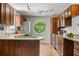 Updated kitchen featuring wood cabinets, granite countertops, and stainless steel appliances at 635 Stone Harbor Sw Pkwy, Marietta, GA 30060