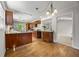 Open kitchen featuring wood cabinets, granite countertops, and stainless-steel appliances at 635 Stone Harbor Sw Pkwy, Marietta, GA 30060