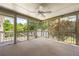 Enjoy the outdoor space in this screened-in porch overlooking mature landscaping and a lake view at 635 Stone Harbor Sw Pkwy, Marietta, GA 30060