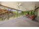 Enjoy the outdoors from this large screened-in porch with views of lush landscaping at 635 Stone Harbor Sw Pkwy, Marietta, GA 30060