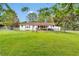 View of the expansive, well-maintained backyard with a charming fence, providing ample space for recreation and relaxation at 95 Stephens Dr, Covington, GA 30016
