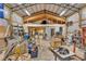 Spacious barn interior with high ceilings, metal frame, overhead lights, and lots of storage space at 95 Stephens Dr, Covington, GA 30016