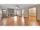 Spacious living room with wood floors, brick fireplace, and natural light at 95 Stephens Dr, Covington, GA 30016