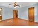 Bedroom with wood floors and two closets for plenty of storage space at 95 Stephens Dr, Covington, GA 30016