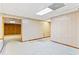 Unfinished basement space offering potential for customization and ample storage at 124 Crown Walk, Mcdonough, GA 30253