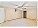 Bedroom features carpet, ceiling fan, and closet space; perfect for relaxation at 124 Crown Walk, Mcdonough, GA 30253
