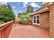 Enjoy the spacious deck, perfect for outdoor entertaining and relaxing with scenic views at 124 Crown Walk, Mcdonough, GA 30253