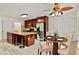 Eat-in kitchen with granite countertops, a large island, and stainless steel appliances at 124 Crown Walk, Mcdonough, GA 30253
