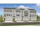 New townhome exteriors with grey brick, multiple windows, and garage doors at 209 Maycrest Path, Tucker, GA 30084