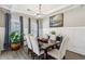 Formal dining room featuring stylish furniture and decor, and ample natural light at 2624 Chase Rdg, Kennesaw, GA 30144