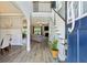 Grand foyer with wood floors, a staircase, and an open view into the living room at 2624 Chase Rdg, Kennesaw, GA 30144