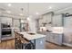 Well-equipped kitchen with an island, stainless steel appliances, and wood floors at 2624 Chase Rdg, Kennesaw, GA 30144