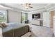A bright main bedroom with a tray ceiling, large windows, and a serene atmosphere at 2624 Chase Rdg, Kennesaw, GA 30144