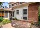 Backyard brick patio with access to screened in porch and home at 1095 Saint Charles Ne Pl, Atlanta, GA 30306