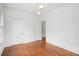 Bedroom with hardwood floors and two interior doors at 1095 Saint Charles Ne Pl, Atlanta, GA 30306