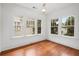 Bedroom with hardwood floors, natural light, and multiple windows at 1095 Saint Charles Ne Pl, Atlanta, GA 30306