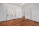 Bedroom with hardwood floors and three interior doors at 1095 Saint Charles Ne Pl, Atlanta, GA 30306