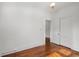 Bedroom with hardwood floors and a neutral color palette and double door closet at 1095 Saint Charles Ne Pl, Atlanta, GA 30306