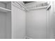 A walk-in closet features painted walls and built-in shelving for storage at 1095 Saint Charles Ne Pl, Atlanta, GA 30306