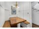 Cozy eat-in kitchen nook with custom seating and stained glass at 1095 Saint Charles Ne Pl, Atlanta, GA 30306