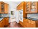 Charming kitchen with wood cabinets and stainless steel appliances at 1095 Saint Charles Ne Pl, Atlanta, GA 30306