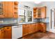 Charming kitchen with wood cabinets and stainless steel appliances at 1095 Saint Charles Ne Pl, Atlanta, GA 30306