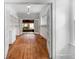 Living room with hardwood floors, built-in bookcase and access to outdoor deck through french doors at 1095 Saint Charles Ne Pl, Atlanta, GA 30306
