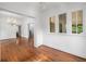 Spacious living room with hardwood floors, chandelier and lots of natural light at 1095 Saint Charles Ne Pl, Atlanta, GA 30306
