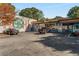 Farm Burger restaurant exterior featuring murals, ample parking, and a casual dining atmosphere at 1095 Saint Charles Ne Pl, Atlanta, GA 30306