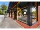 Inviting restaurant exterior with large windows, brick accents, and clear signage for 'Surin of Thailand' at 1095 Saint Charles Ne Pl, Atlanta, GA 30306