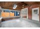 Spacious screened-in porch featuring brick accents, a skylight, and tiled flooring at 1095 Saint Charles Ne Pl, Atlanta, GA 30306