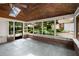 Relaxing screened porch with brick accents and views of the backyard garden at 1095 Saint Charles Ne Pl, Atlanta, GA 30306