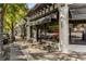 Inviting storefront with outdoor seating, brick facade, and large windows, perfect for enjoying the neighborhood vibe at 1095 Saint Charles Ne Pl, Atlanta, GA 30306