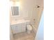 A clean, compact bathroom with a white vanity, toilet, and shower-tub combination with tiled walls at 1212 Utoy Springs Rd # 46, Atlanta, GA 30331