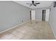 Bedroom with a ceiling fan, closet and tiled floors at 1212 Utoy Springs Rd # 46, Atlanta, GA 30331
